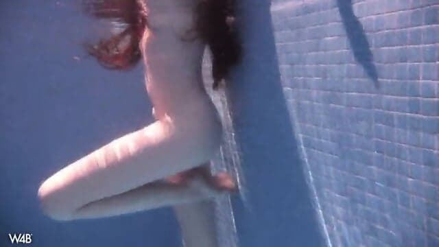 Naked Girl Is Swimming In The Pool